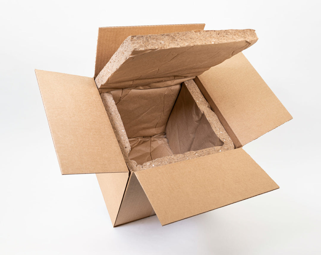 brown box with insulation in it to keep products cold during shipping.